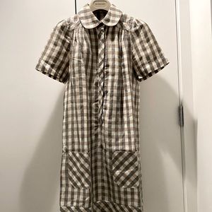 Gingham short sleeve mini dress with self belt. With pockets